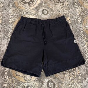 Reigning Champ Heavyweight Jersey Shootaround Relaxed Short 7" in Navy